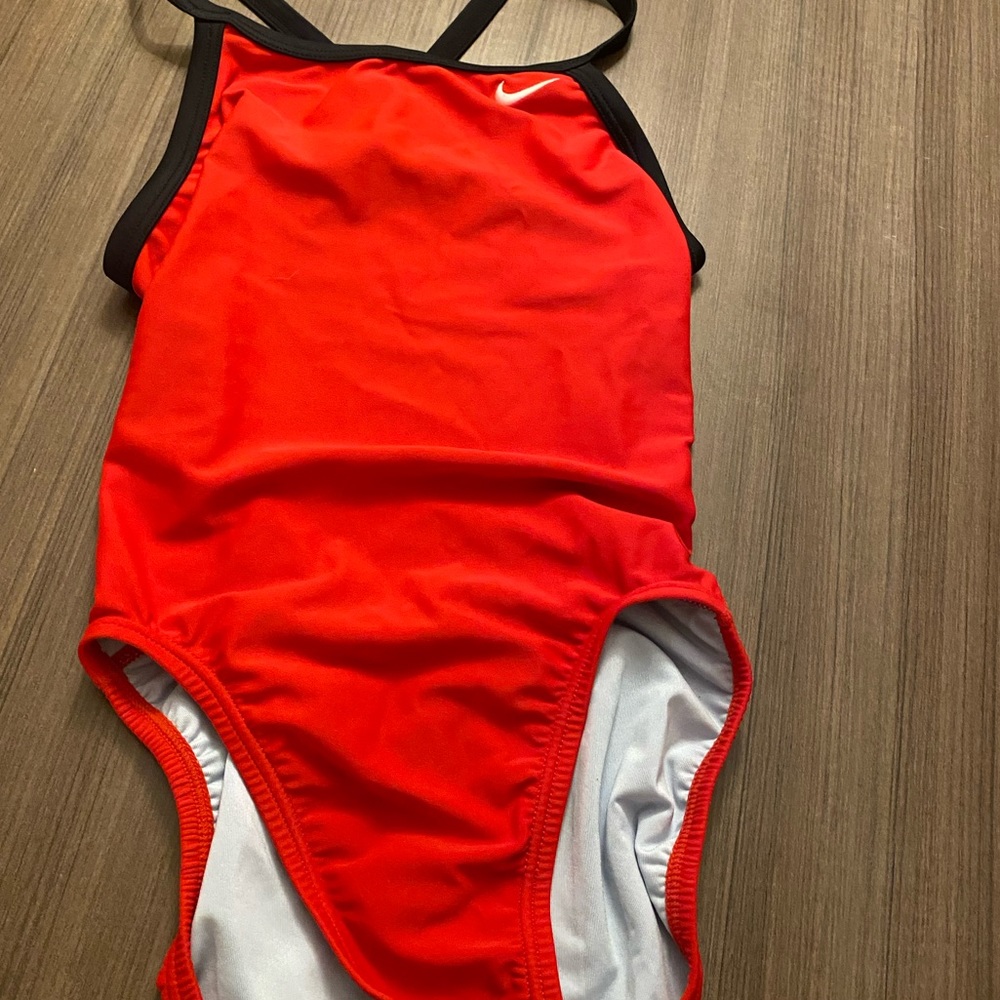 Girls NIKE one piece bathing suit in red.